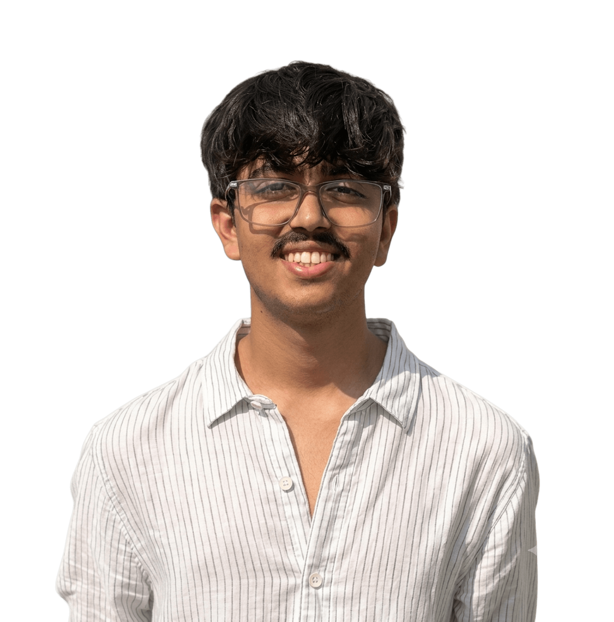 Dhruv Gupta, smiling, in a striped shirt